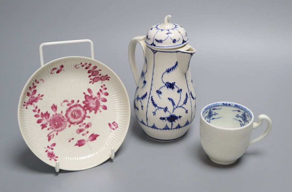 A Tournai covered jug and a similar coffee cup, c.1770 and a similar Zurich puce saucer, c.1775 (4), jug 16cm, ex Klaber & Klaber